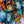 Abstract artwork with a mix of blue, red, yellow, and black colours. By artist John Berrick.