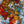 Abstract artwork with dynamic red, blue and yellow colours. By artist John Berrick.